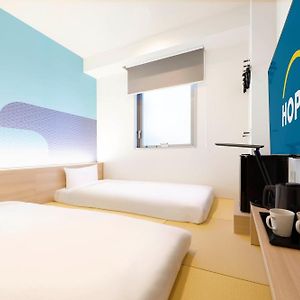Kamer met Twee Aparte Bedden in Japanse Stijl